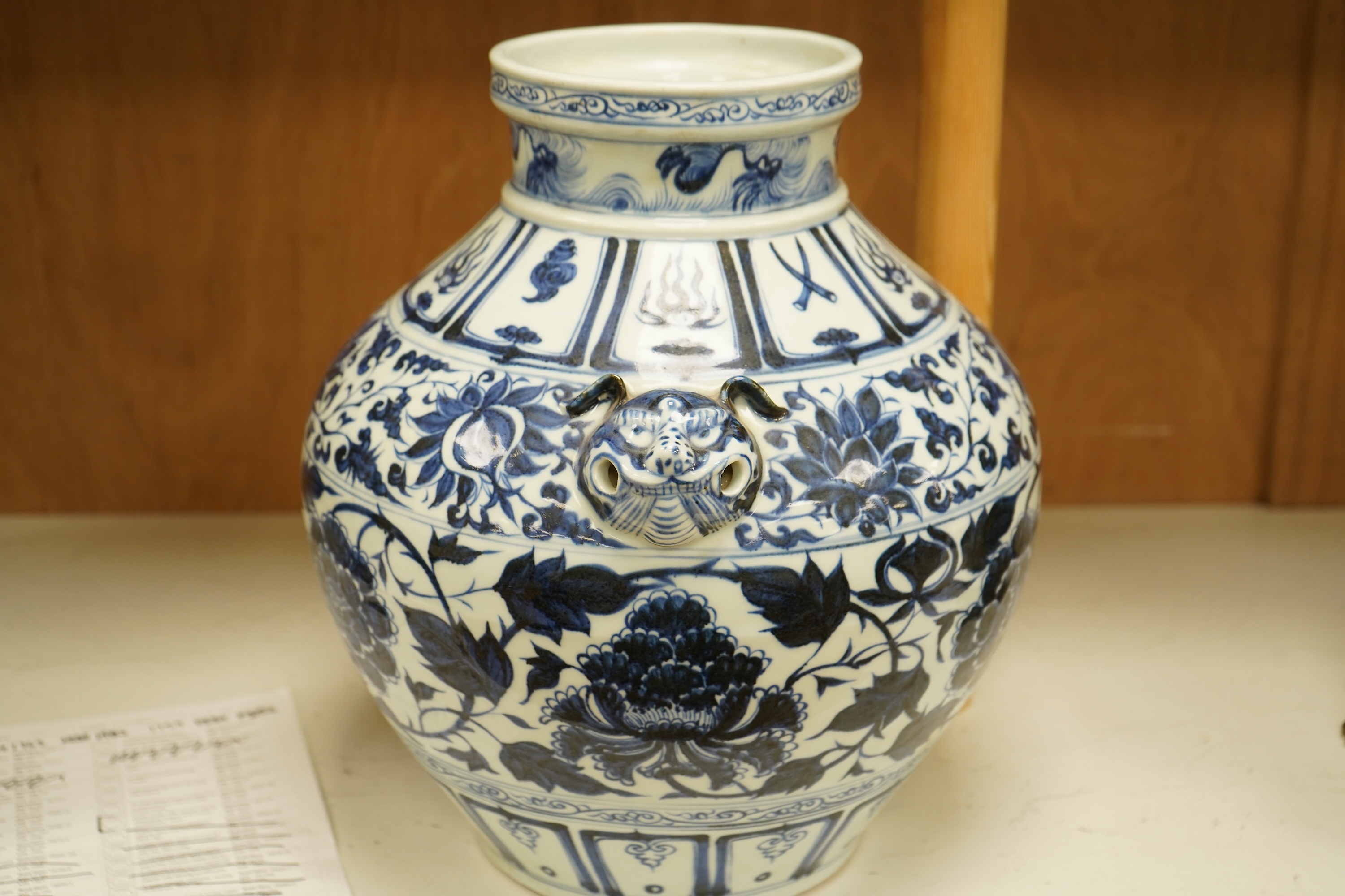 A Chinese blue and white pot vase with zoological handles, 38cm high